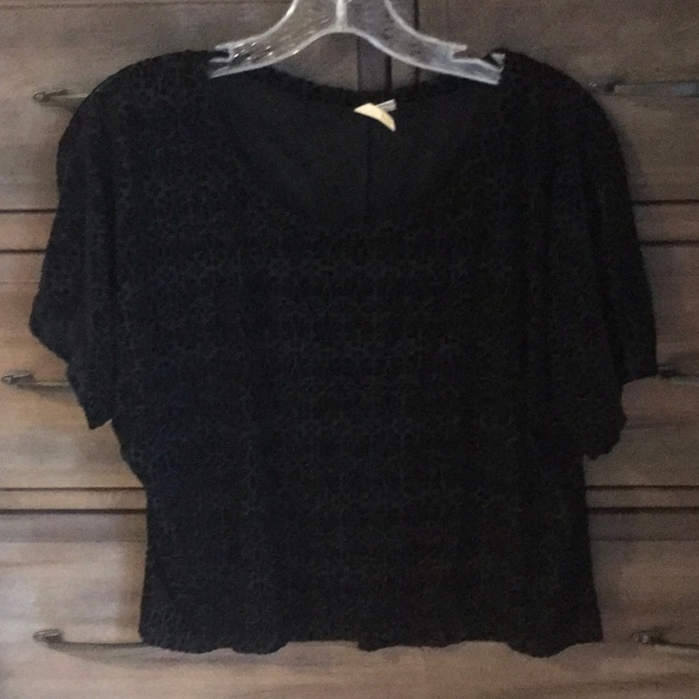 Black partly sheer flowy top